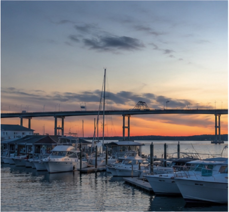 Sailboats in a marina at sunset in Hampton, Virginia