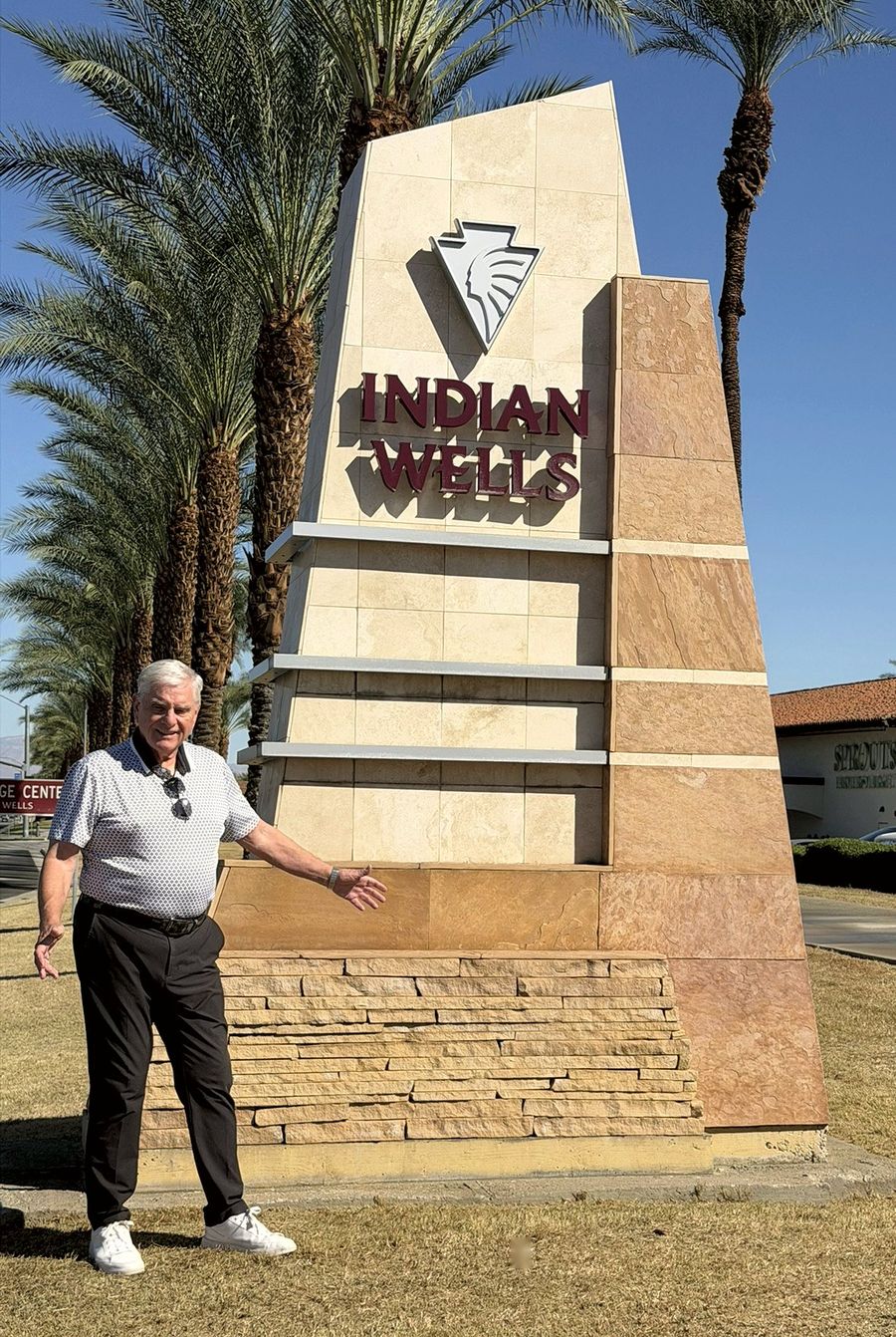 Steve James at the Indian Wells city sign